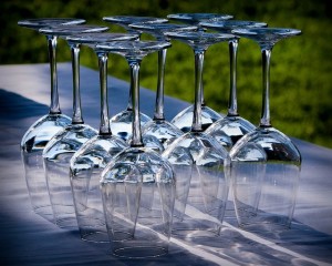 upside-down wine glasses on a table